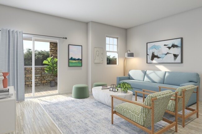 Flats at Sugar Run Delaware Ohio apartments showing a living area with patio. - Flats at Sugar Run