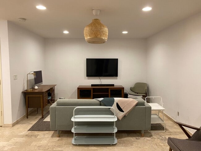 Tastefully Furnished Living Room - 65 “ Samsung - 5651 Sumner Way Unit 209