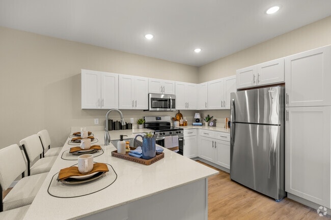 3BR, 2.5BA - 1,451SF - Kitchen - Living Fully Orchard Farms