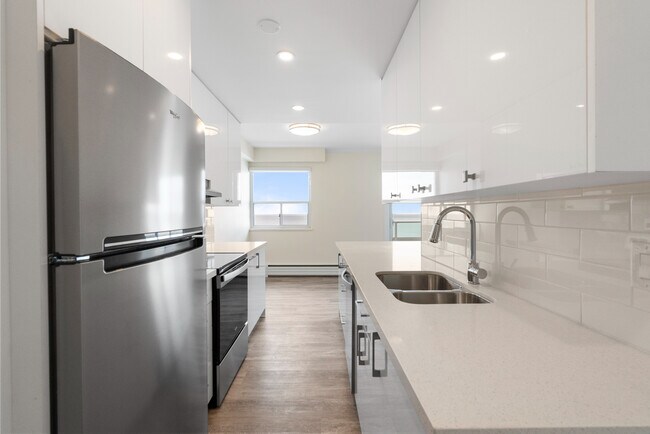 Building Photo - 2440 Queen Street East Unit 1