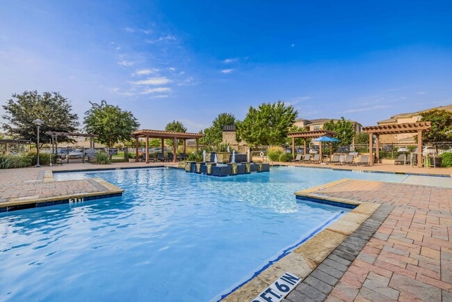 Resort-style Swimming Pool with Tanning Ledge and Sundeck