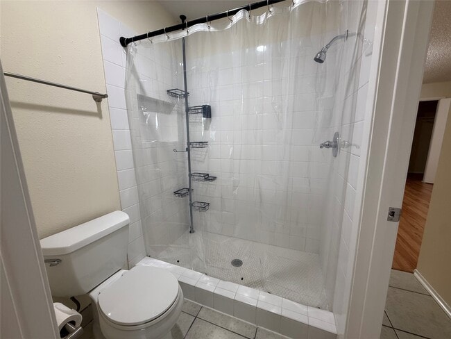 Building Photo - 3837 Tanglewilde St Unit 3837