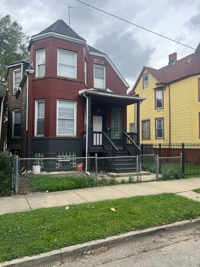 Building Photo - 7432 S Maryland Ave Unit 1