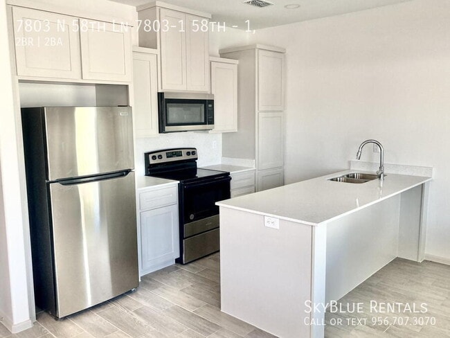 Building Photo - 7803 N 58th Ln Unit 1,