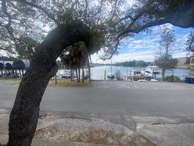 Photo - Cozy & Economical Unit in The Cove w/Waterfront Views of Massalina Bayou & Marina!