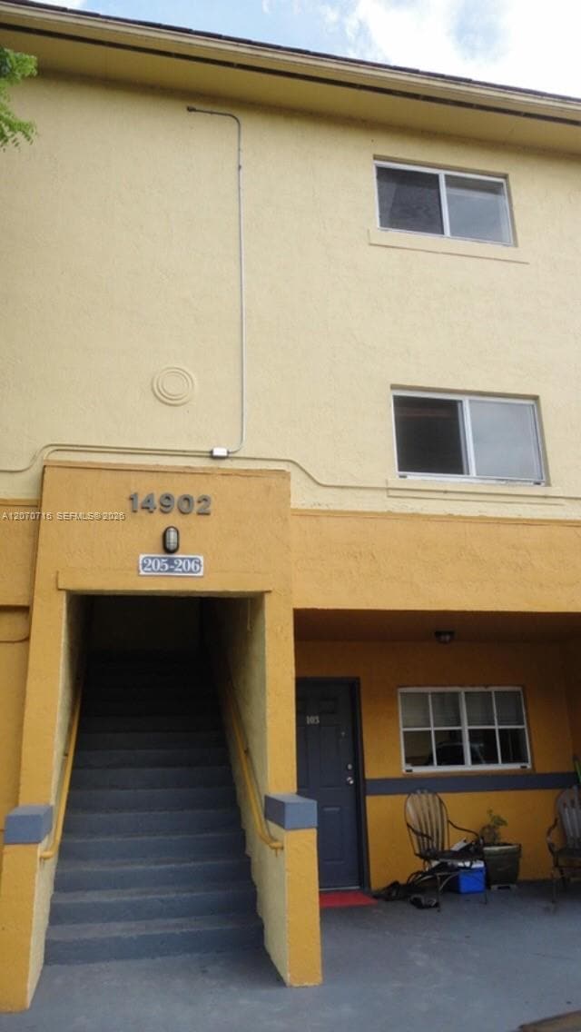 Building Photo - 14902 SW 82nd Ln Unit 13-206
