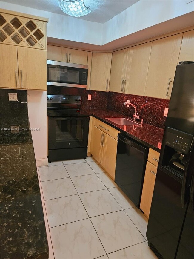 Photo - 8425 Harding Ave Unidad 1