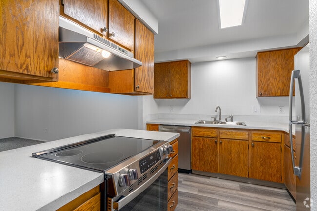 2BR, 1.5BA - 1,180SF - Kitchen - Royal Ridge Condominiums