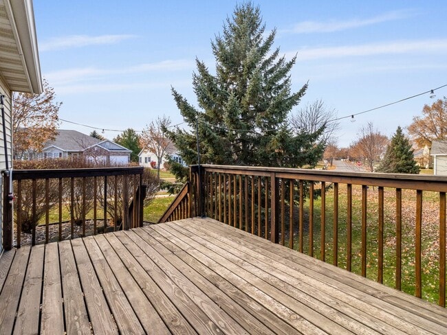 Photo - Spacious 3BR/3BA Condo with Finished Basement + 2-Car Garage — Available Now