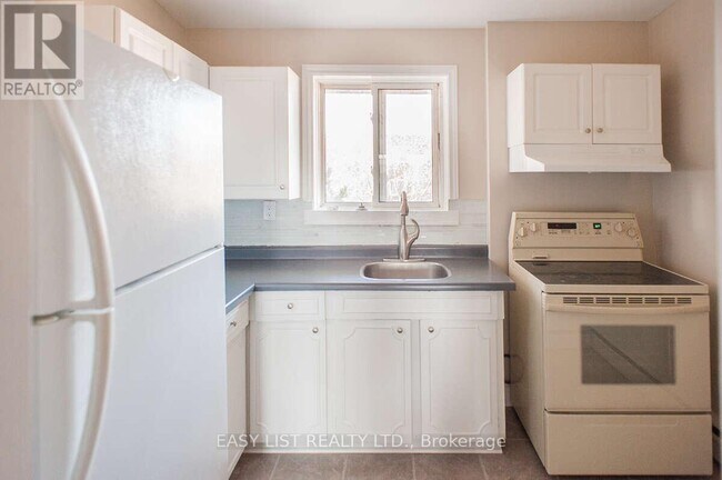 Photo - 8650 Wyandotte St E Unité 34