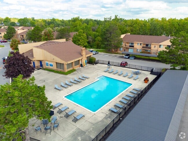 Sparkling Swimming Pool and Sun Deck at Franklin River Apartments in Southfield, MI - Franklin River Apartments