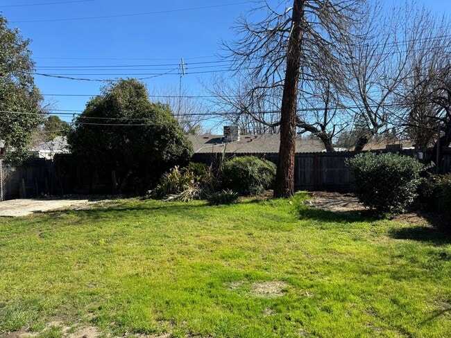 Photo - 3 BR/1BA | Newly Renovated Single Family Home | 1-Car Covered Parking | Large backyard