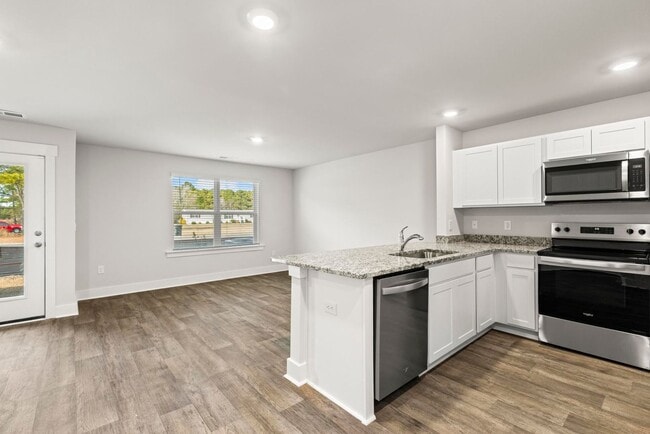 Photo - MOVE IN SPECIAL- ONE FREE MONTH RENT WITH A LEASE SIGNED BY FEB. 1!!