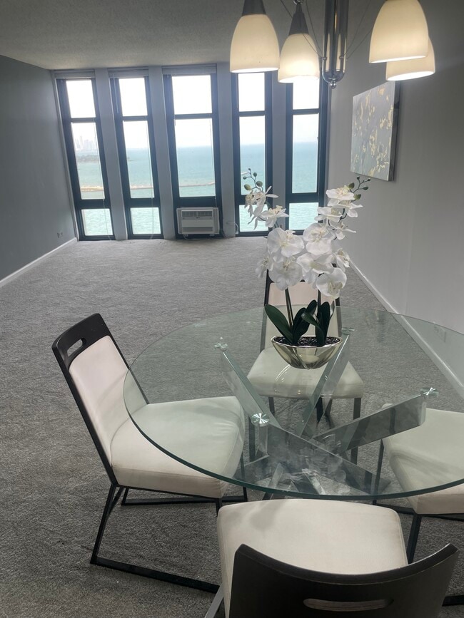 Living Room - 6700 S South Shore Dr Unit 27J