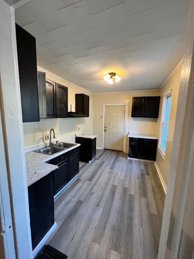 Photo - 114 Dr Samuel McCree Way Unit Downstairs