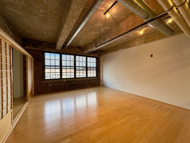 Photo - Stunning Industrial-Contemporary One Bedroom Condo- Parking included!