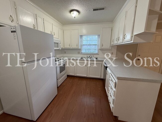 Photo - Charming 3-Bedroom with Fireplace & Modern...