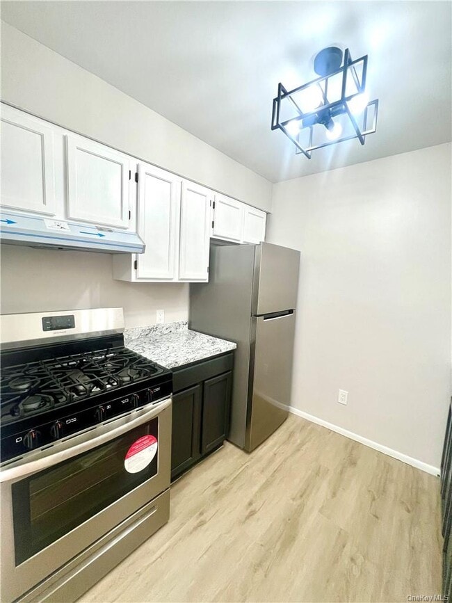 Building Photo - 13-19-19 Cole St Unit A22