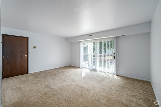 2BR, 1BA - 975SF - Living Room - Quail Creek Apartments