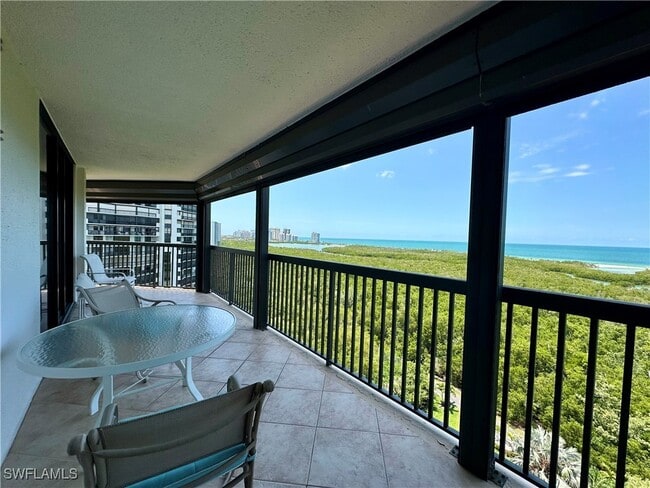 Building Photo - 6075 Pelican Bay Blvd Unit 1101 Rental