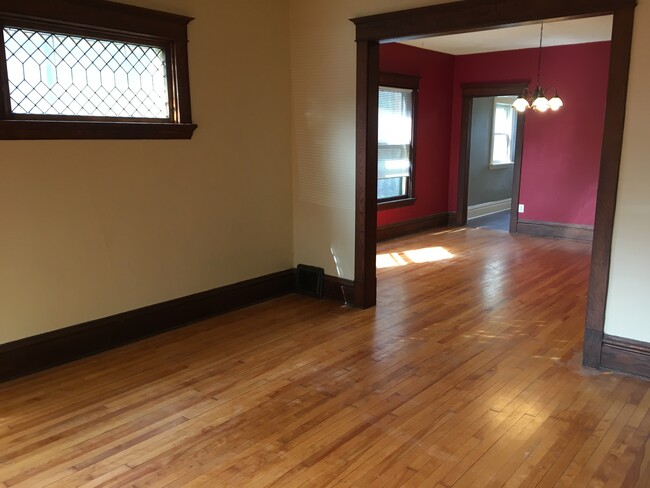 Living room, looking into dining - 832 Jenifer St Apartments Unit 1