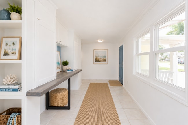 Photo - Live the ultimate Space Coast waterfront lifestyle at this stunning beachside canal home in Satel...
