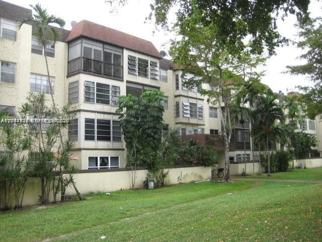 Building Photo - 7300 NW 17th St Unit 210