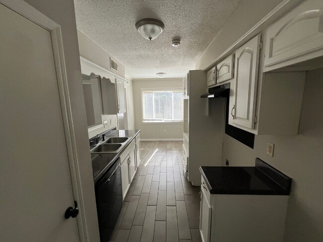 Spacious 4BR/2BA Memphis Home | 1,913 Sq Ft, Hardwood Floors, Brick Fireplace & Fenced Yard