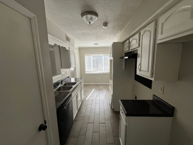 Photo - Spacious 4BR/2BA Memphis Home | 1,913 Sq Ft, Hardwood Floors, Brick Fireplace & Fenced Yard