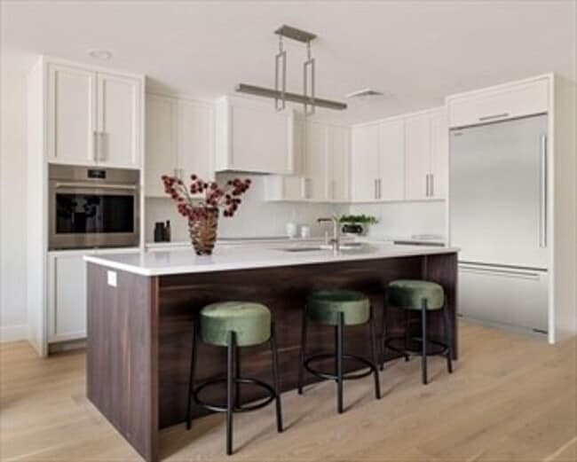 Building Photo - 1 Bed • 1.5 Bath • Garage Parking • New Luxury Building – Available Now, December, or January