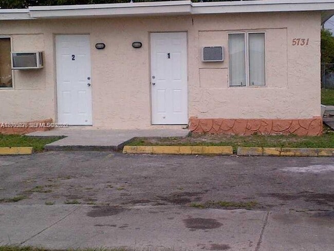 Building Photo - 5731 Flagler St Unit 1