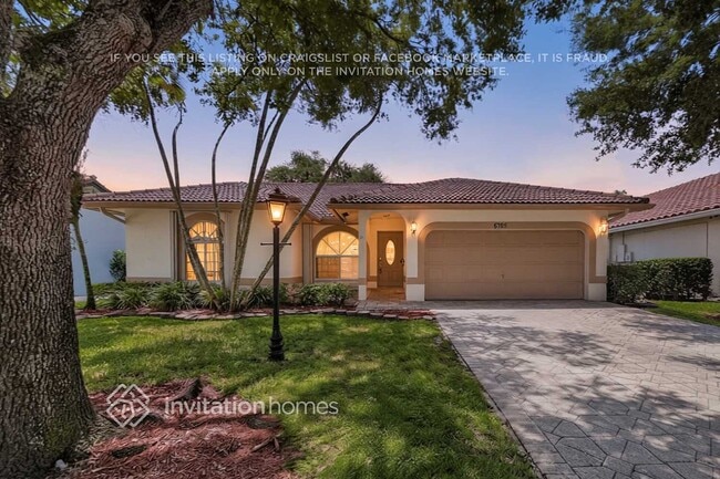 Building Photo - 5788 NW 48th Dr