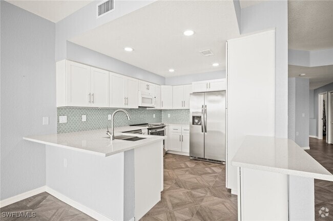 Building Photo - 16261 Coco Hammock Way Unit 102 Rental