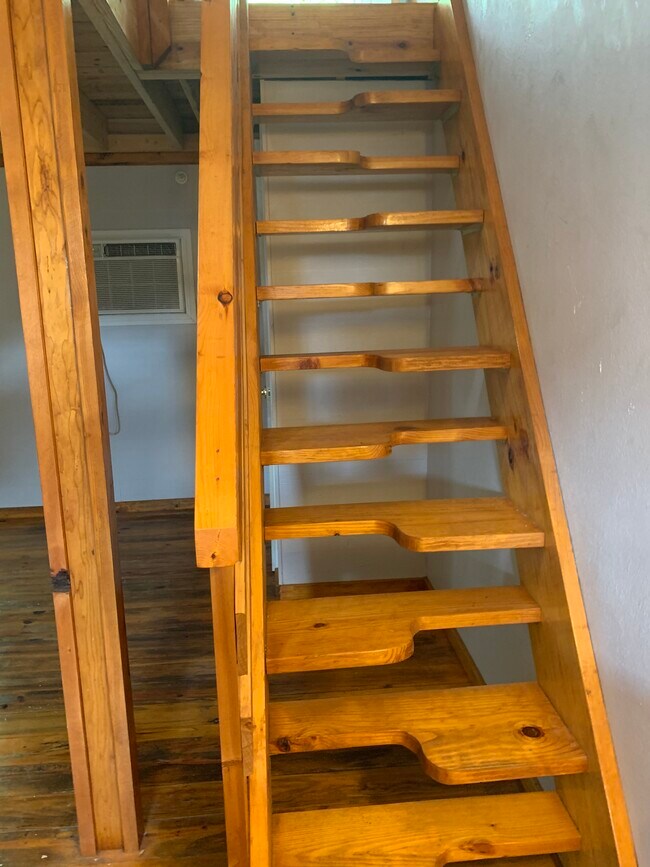 Stairs with AC in the background - 1112 Cardinal St #102 Unit Lofts on Lanana