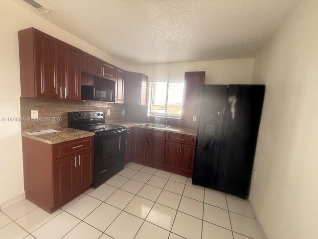 Building Photo - 6278 W 22nd Ct Unit 21