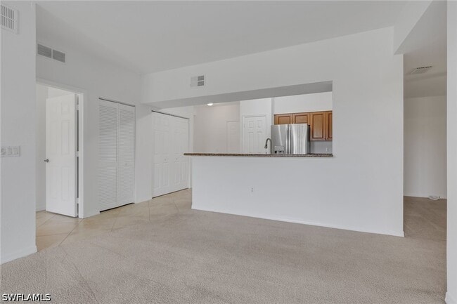 Building Photo - 20261 Estero Gardens Cir Unit 108