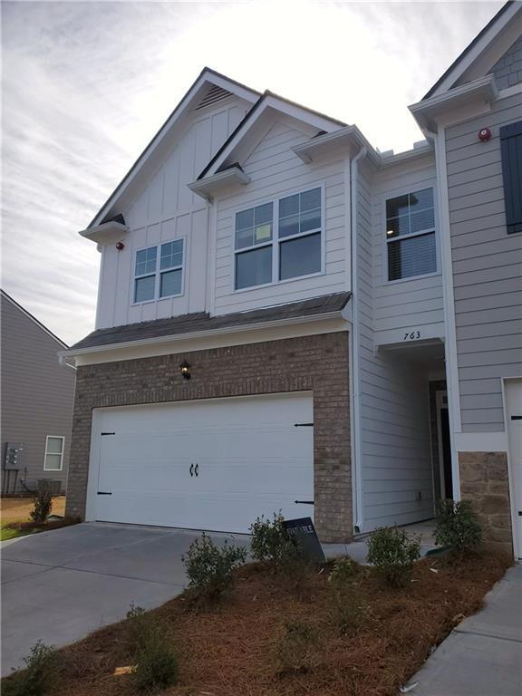 Photo - 763 Woodstock Grove Dr Townhome