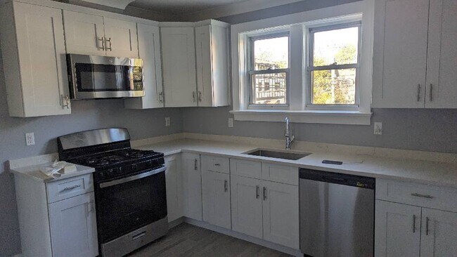 Photo - Renovated Modern 2 Bedroom -  No Fee Unit 2