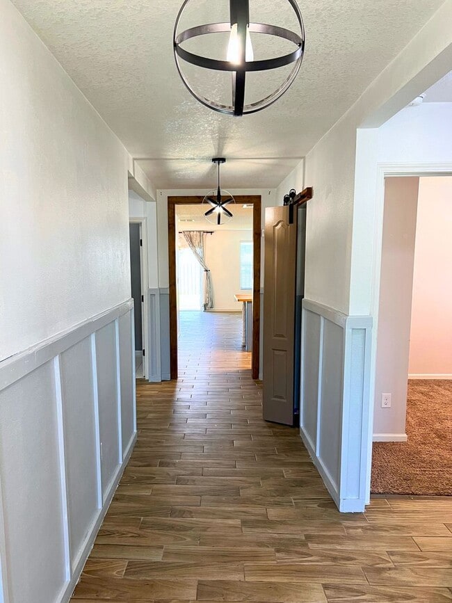 Photo - Stylish 4-Bedroom Home with Fenced Yard – Prime Location!