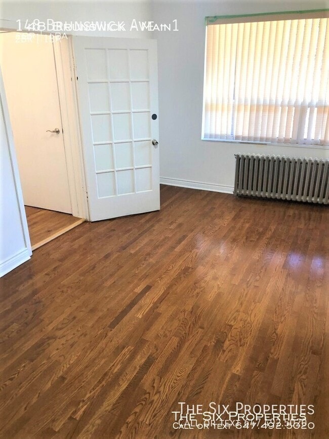 Photo - Bright 2 Bedroom Main Floor Apartment Near UoFT Unité 1