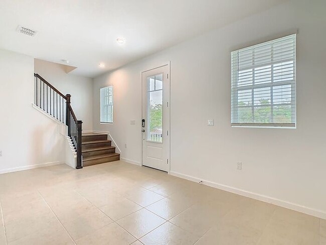 Photo - New Luxury Townhome in Celebration, FL Corner unit. All porcelain tiled floors. Aleutian model by...