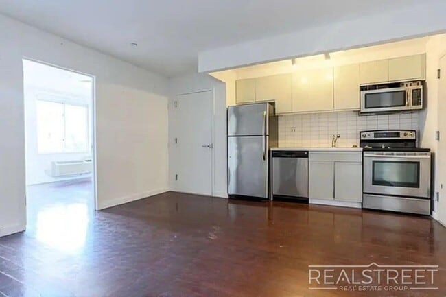 Photo - Flexible 1BR + Office or 2BR in Bushwick | Laundry & Two Rooftop Decks Unidad 3D