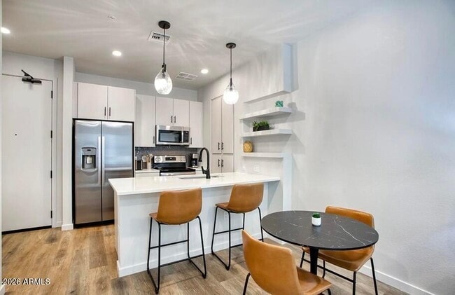 Building Photo - 9449 N 90th St Unit A2