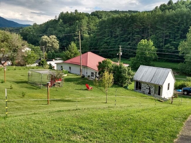 Photo - Cute Cottage overlooking Downtown Lansing - Walk to Stores, Park & Creek!