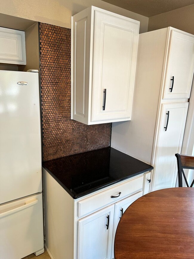 Photo - 3 Bedroom 2 Bath Townhome with Gas Fireplace, community pool, lots of storage