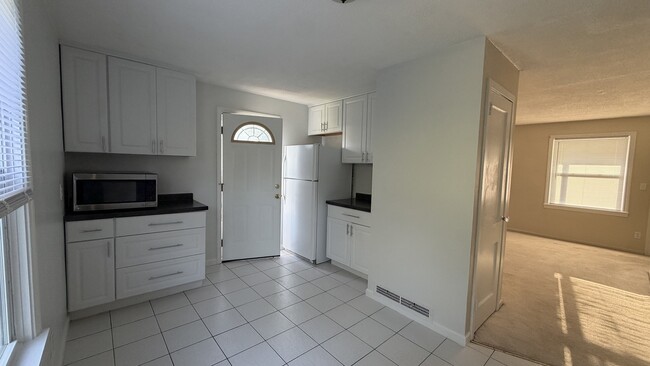 Kitchen side entrance - 55 Birch Rd Unit 55 Birch Road