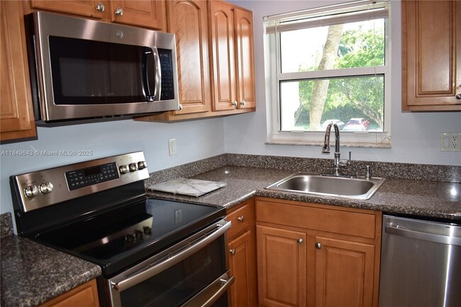 Photo - 8590 Sunrise Lakes Blvd Unit 211