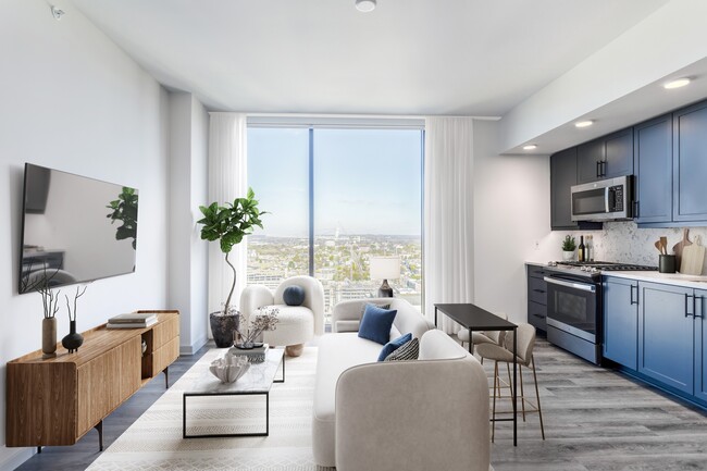 Studio with Floor to Ceiling Windows with a View of the City.