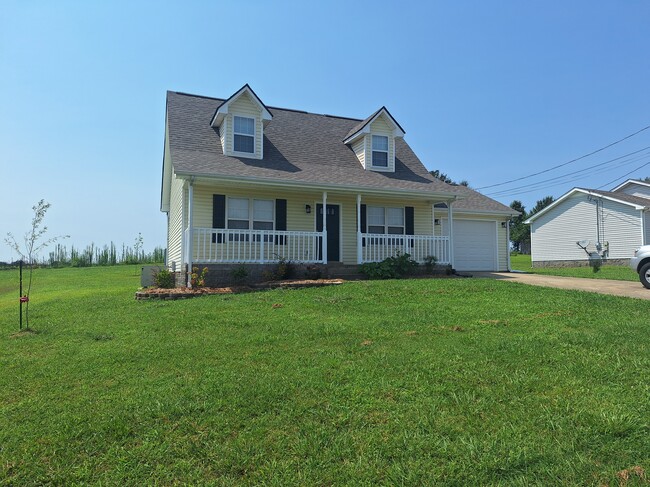 Front of home with new landscaping - 695 Artic Ave