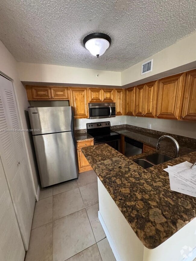 Building Photo - 12142 Saint Andrews Pl Unit 110 Rental